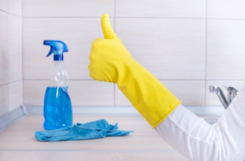 Professional deep sofa cleaning equipment in use
